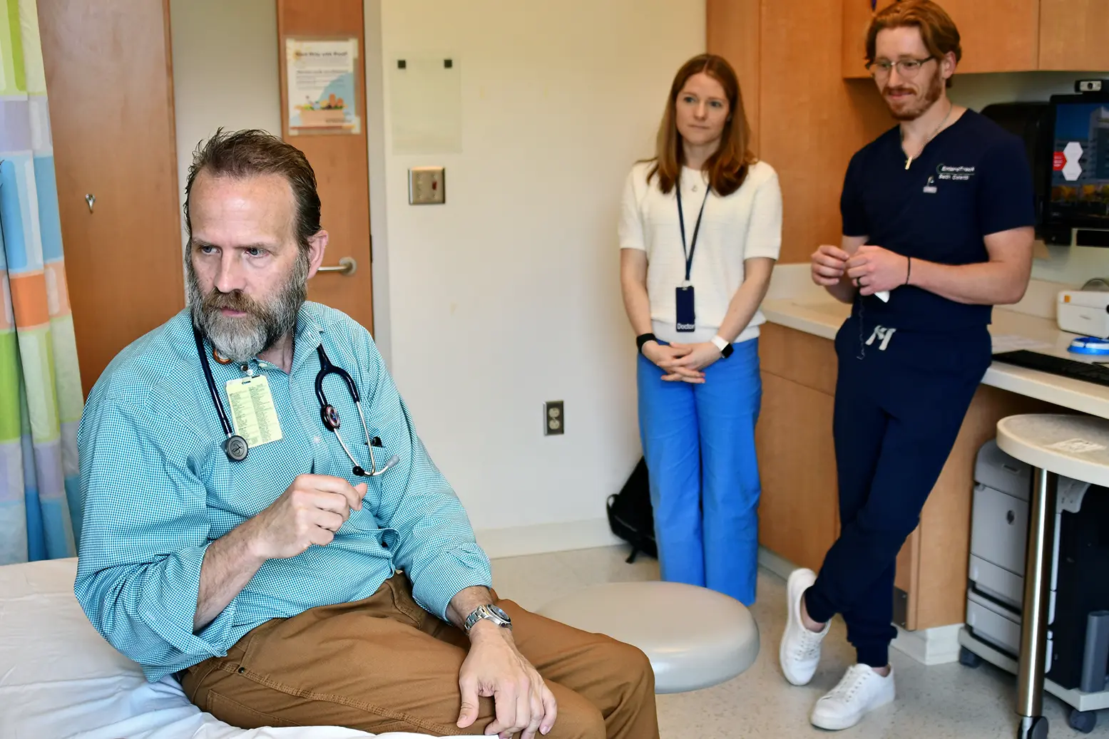 Clinicians discussing EnteroTracker